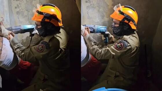 bombeiro quebrando parede